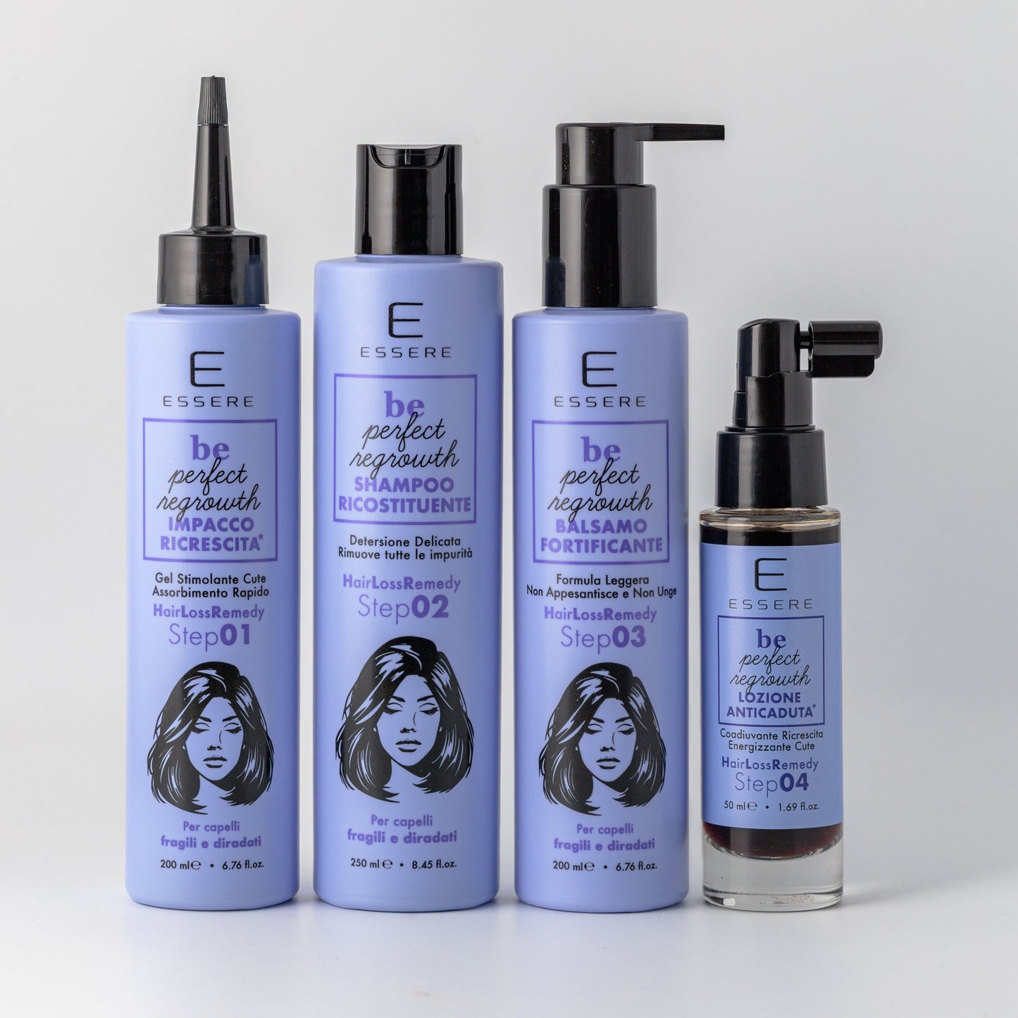 I quattro prodotti Be Perfect Regrowth Essere Bio in fila, flaconi lilla su fondo chiaro visti di fronte