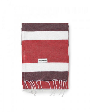 Guy Laroche beach towel for Essere Bio, red and burgundy cotton stripes, folded on a white background